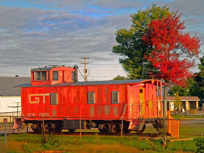 Orange Caboose.jpg :: This photo was taken from a train in Michigan. To purchase a fine art print of this photograph go to michael-durst.artistwebsites.com  To view comments, click on \
