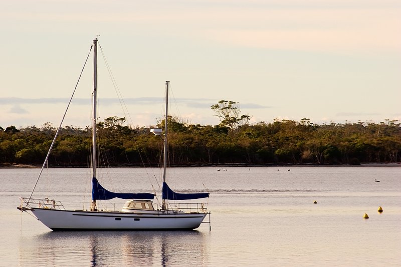 Australia 120.jpg :: A boat sits at her moorings in an Australian estuary