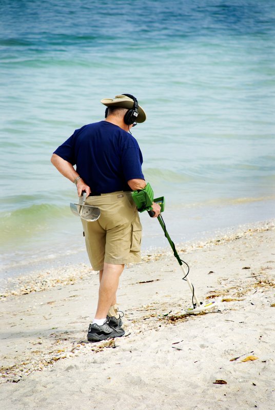 Metal Detector.jpg :: Man with metal detector on beach