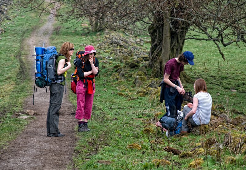 Young Hikers.jpg :: Group of young hikers hiking the West Highland Way in the Scottish Highlands, Scotland.