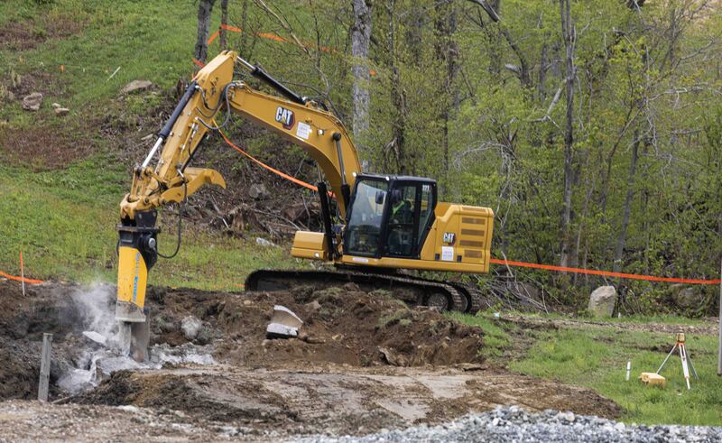 GQ7A7545-3 copy.jpg :: May 19 Breaking up the concrete of the old base terminal