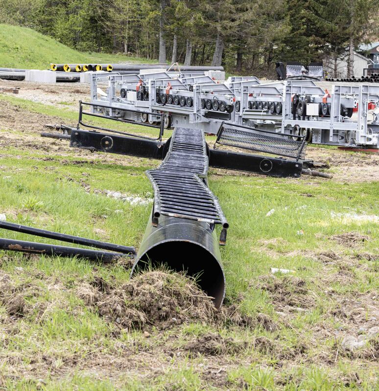 GQ7A7575 copy.jpg :: An old lift tower sits next to new lift parts