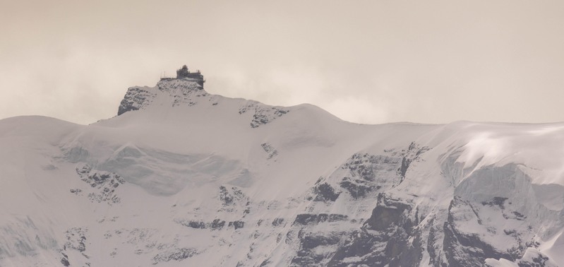 GQ7A9583 copy.jpg :: Jungfraujoch is a World Heritage Site at (3454m) and sits in the saddle between Monch (4107m) and Jungfrau (4158m). It can be reached via a cog rail train through a tunnel from Eigergletscher. 