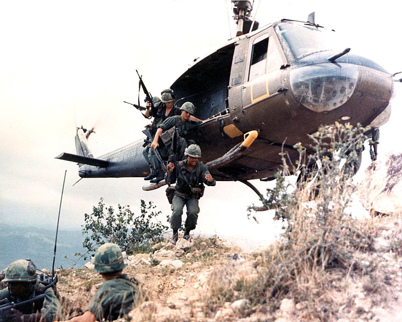 1st Cav Div - V1006B.jpg :: 1st Cav Div, Vietnam War - US ARMY PHOTO: Troopers of the 1st Cavalry Division dismount from a hovering Huey helicopter during the Vietnam War. Blue Team 1st Squadron 9th Cavalry 1st Air Cav troops dismount , circa 1965-70.