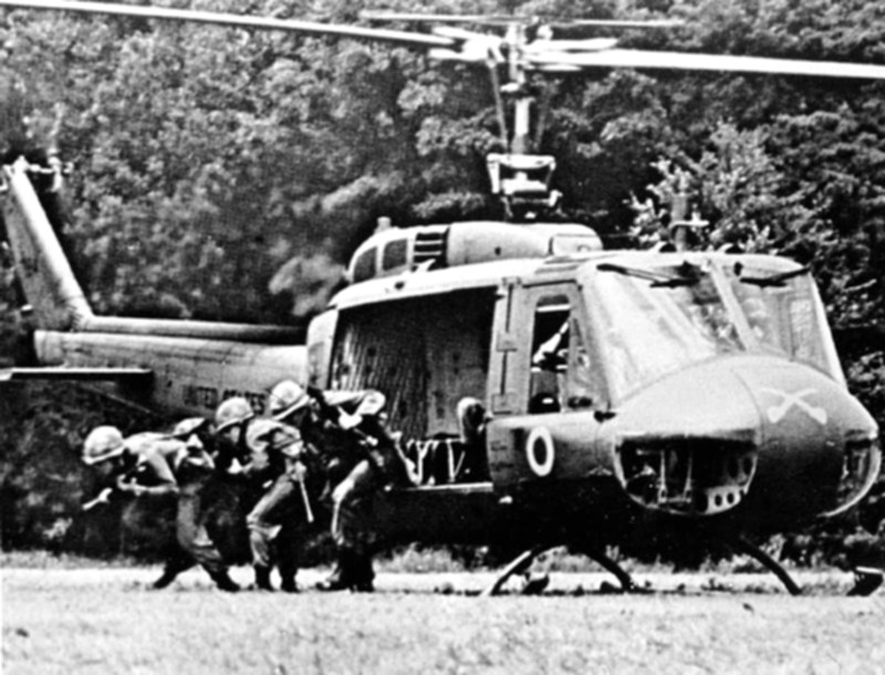 1st Cav Div - V1006C.jpg :: 1st Cav Div, Vietnam War - US ARMY PHOTO: A U.S. Army rifle squad from the Blue Team of the 1st Squadron, 9th Cavalry exiting from a Bell UH-1D Huey helicopter in Vietnam. The 1st Squadron, 9th Cavalry Regiment was the air cavalry reconnaissance squadron of the 1st Cavalry Division throughout the division's service in Vietnam from 1965 to 1972. The \