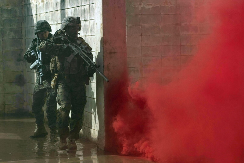3rd Marine Div - M26139C.jpg :: 3rd Marine Div, Post-Vietnam War - US MARINES PHOTO: U.S. Marine Corps Lance Cpl. Ahmier Fillmore and a Republic of Korea Marine navigate in close-quarters during Korea Viper 24.1 at Camp Mujuk, Republic of Korea, Feb. 7, 2024. Urban operations training strengthens Marines' proficiency in navigating and engaging in urban terrain, ensuring readiness through realistic training of close-quarters combat scenarios. In its first iteration, Korea Viper demonstrates the ROK-US Marine Corps ability to respond decisively in the region as a singular, unified force while strengthening relationships and trust between the two allies. Fillmore, a native of New Jersey, is a rifleman 2d Battalion, 7th Marines. 2/7 is forward deployed in the Indo-Pacific under 4th Marine Regiment, 3d Marine Division as part of the Unit Deployment Program. (U.S. Marine Corps photo by Lance Cpl. Evelyn Doherty).