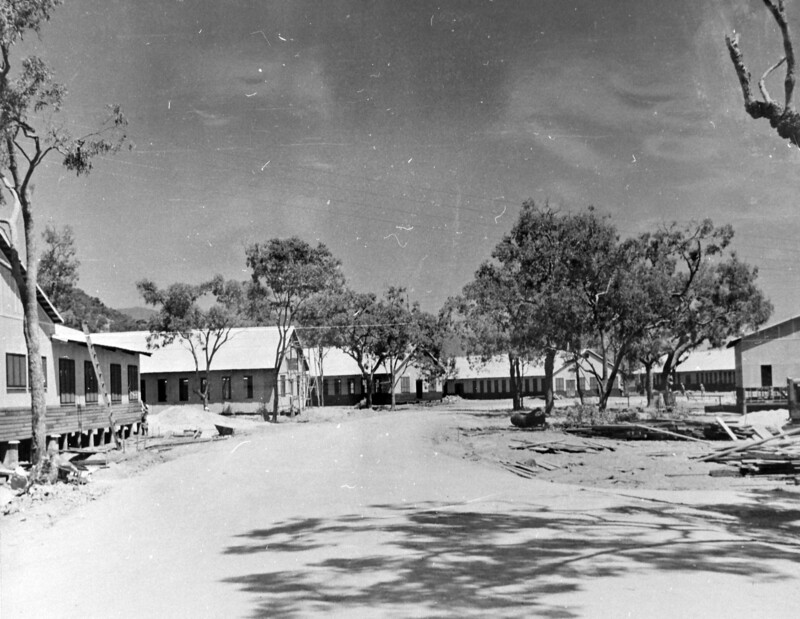 N23852B.jpg :: Naval Air Station, Palm Island, WW II - US NAVY PHOTO: The US Navy decided in early 1943 to build a US Naval Air Station at Palm Island, which is located off the Queensland coast north of Townsville. It was to have facilities to allow it to operate and overhaul seaplanes and patrol boats. Palm Island is the largest of a number of small islands. The island covers approximately 23 square miles. With the exception of a few small areas, the terrain is very rugged from the water's edge. The US Naval Air Station overlooked a large stretch of sheltered water in Challenger Bay, which was ideal for flying boat operations. Two officers and 122 enlisted men of Company \