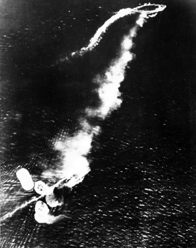 Pearl Harbor (Attack) - B23601A.jpg :: Pearl Harbor, Attack, WW II - US NAVY PHOTO: Aerial view of burning ships at Pearl Harbor, 7 Dec 1941.
