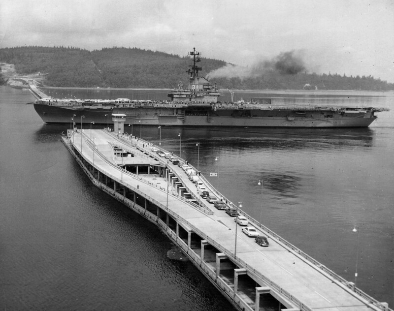 USS Bon Homme Richard (CVA-31) - N437L.jpg :: USS Bon Homme Richard (CVA-31), Aircraft Carrier Attack, Vietnam War - US NAVY PHOTO: Poulsbo, Wash. (Jul 25, 1963) - USS Bon Homme Richard (CVA-31) transits the Hood Canal Bridge, which opened 12 Aug 1961. This is a floating pontoon bridge with a retractable draw span and carries Washington State Route 104. The bridge connects the Kitsap & Olympic Peninsulas.