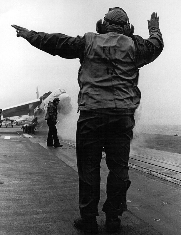 USS Bon Homme Richard (CVA-31) - N438G.jpg :: USS Bon Homme Richard (CVA-31), Aircraft Carrier Attack, Vietnam War - US NAVY PHOTO: South China Sea - catapult crewman uses hand signals to direct positioning of an F-8 Crusader fighter prior to launch from the flight deck of the attack aircraft carrier USS Bon Homme Richard (CVA-31). The aircraft will be flying a mission over Vietnam. Photographed by JOC R.D. Moeser, USN.
