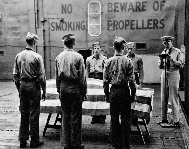 USS Cabot (CVL-28) - N635H.jpg :: USS Cabot (CVL-28), Light Aircraft Carrier, WW II - US NAVY PHOTO: Burial at sea, 30 Apr 1944. AMM2/c Wallace James Schuetz, Torpedo Squadron (VT) 8, Carrier Air Group (CAG) 8, USS Bunker Hill (CV-17) was killed in action the previous day, while attacking Truk, when his aircraft (TBF-1C) Avenger (BuNo 47922, No. 27), was hit by Japanese AAA. Since the flight deck of his own carrier was fouled, and believing his gunner was seriously wounded but still alive, pilot, ENS (LT(JG) L.G. Mason, recovered aboard USS Cabot (CVL-28). Sadly, 22-year-old Schuetz was already dead. He was buried at sea with full military honors at 1116, 30 Apr.