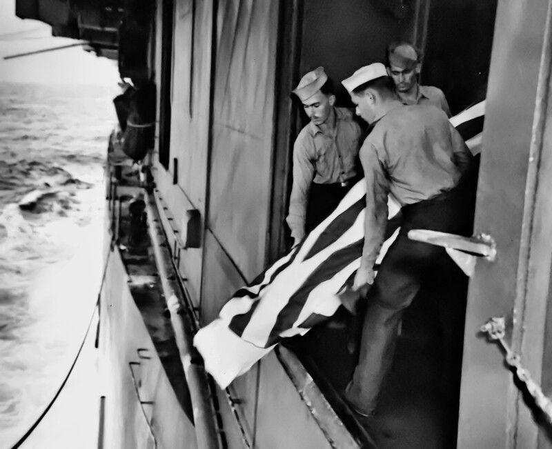 USS Cabot (CVL-28) - N635J.jpg :: USS Cabot (CVL-28), Light Aircraft Carrier, WW II - US NAVY PHOTO: Burial at sea, 30 Apr 1944. AMM2/c Wallace James Schuetz, Torpedo Squadron (VT) 8, Carrier Air Group (CAG) 8, USS Bunker Hill (CV-17) was killed in action the previous day, while attacking Truk, when his aircraft (TBF-1C) Avenger (BuNo 47922, No. 27), was hit by Japanese AAA. Since the flight deck of his own carrier was fouled, and believing his gunner was seriously wounded but still alive, pilot, ENS (LT(JG) L.G. Mason, recovered aboard USS Cabot (CVL-28). Sadly, 22-year-old Schuetz was already dead. He was buried at sea with full military honors at 1116, 30 Apr.