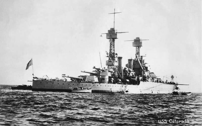 USS Colorado (BB-45) - N3157K.jpg :: USS Colorado (BB-45), Battleship, Post-WW-I - US NAVY PHOTO: Circa 1920's image of an anchored USS Colorado (BB-45) in company with other ships of the Pacific fleet. From 1924 to 1941 Colorado operated with the Battle Fleet in the Pacific, participating in fleet exercises and various ceremonies, and returning to the east coast from time to time for fleet problems in the Caribbean. Note her top rear turret has a catapult for the launching of observation planes and the foremast of a tripod mast rising over her bow from a near by anchored warship.