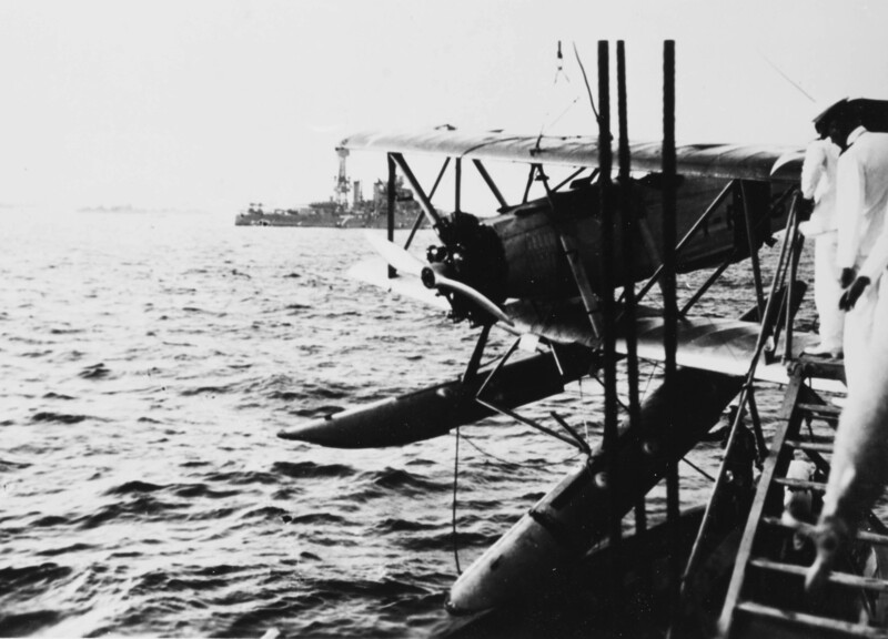 USS Colorado (BB-45) - N3157M.jpg :: USS Colorado (BB-45), Battleship, Post-WW-I - US NAVY PHOTO: Naval Air Force TS-1 Airplane of Fighting Squadron One is hoisted aboard USS Colorado (BB-45) after an accident, during maneuvers off Central America, circa 1925-1927. Note broken float supports and other damage.