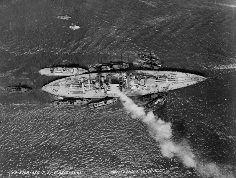 USS Colorado (BB-45) - N3158E.jpg :: USS Colorado (BB-45), Battleship, Post-WW I - US NAVY PHOTO: Vertical aerial photograph of the USS Colorado (BB-45), taken in harbor on 2 May 1927 with three large and five smaller harbor tugs alongside and one astern.