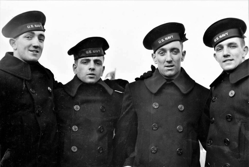 USS Juneau (CL-52) N2388E.jpg :: Four Rogers brothers at the commissioning ceremony for the Juneau at the New York Navy Yard 14 February 1942. Left to right: Joseph, Patrick, Louis, and James. Unlike the Sullivan brother, their story was not quite as tragic with Joseph and James surviving.