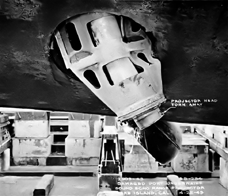 USS Kingfish (SS-234) - N9376J.jpg :: USS Kingfish (SS-234), Submarine - Attack-Fleet, WW II - US NAVY PHOTO: Damage to starboard QB sonar projector on the USS Kingfish (SS-234). Both the port and starboard projectors were extended when the boat was forced to the bottom by depth charge explosions on 24 Mar 1943 off Formosa.