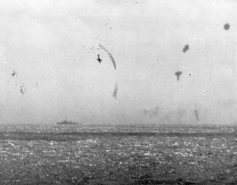 USS Langley (CVL-27) - N624H.jpg :: USS Langley (CVL-27), Light Aircraft Carrier, WW II - US NAVY PHOTO: A Japanese plane is downed during an attack on Task Group 38.3. Photographed by USS Langley (CVL-27). Released on 25 Nov 1944.