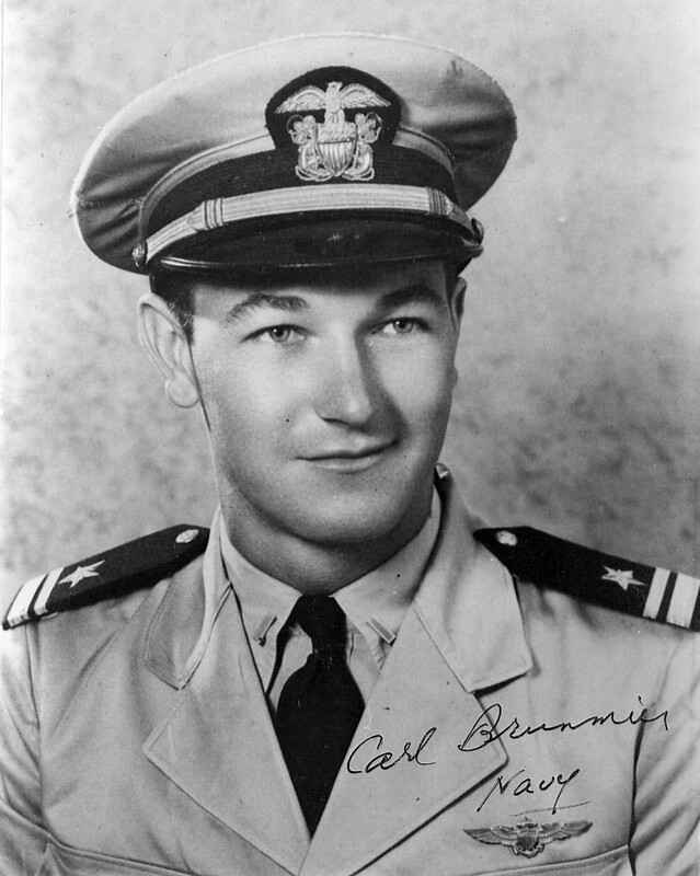 USS Langley (CVL-27) - N624K.jpg :: USS Langley (CVL-27), Light Aircraft Carrier, WW II - US NAVY PHOTO: LT Carland Edward Brunmier of Fighting Squadron VF-44 downed six Japanese planes to earn the title 'fighter ace.' He was awarded the Navy Cross during his tour aboard the USS Langley (CVL-27). The Fighting Squadron VF-44 'Crusaders' was embarked aboard the USS Langley (CVL-27) from Oct 1944 to Feb 1945 flying F6F Hellcats. The squadron was commanded by CDR Malcolm T. Wordell (Ace with Seven Kills). Navy Citation reads: The President of the United States takes pleasure in presenting the Navy Cross to Carland Edward Brunmier, Lieutenant Commander [then Lieutenant], U.S. Navy (Reserve), for extraordinary heroism in operations against the enemy while serving as Pilot of a carrier-based Navy Fighter Plane in Fighting Squadron FORTY-FOUR (VF-44), embarked from the U.S.S. Langley (CVL-27), in action against enemy Japanese forces during the Battle for Leyte Gulf, on 25 Oct 1944. After one of our carriers had been seriously damaged, Lieutenant Commander Brunmier courageously led his division in a daring attack against twelve Japanese fighter planes within a much larger formation and, despite the overwhelming odds, succeeded in destroying three enemy planes, thereby contributing in large measure to the dispersal of the hostile forces at a critical time when it was within thirty miles of our surface units. By his splendid airmanship and gallant devotion to duty, Lieutenant Commander Brunmier upheld the highest traditions of the United States Naval Service'. Commander, 2d Carrier Task Force, Pacific: Serial 0568 (22 Dec 1944).
