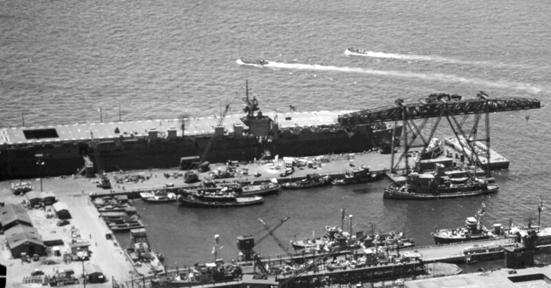 USS Langley (CVL-27) - N625K.jpg :: USS Langley (CVL-27), Light Aircraft Carrier, WW II - US NAVY PHOTO: An aerial view of the Pearl Harbor shipyard piers on 13–14 Aug 1945, with USS Langley (CVL-27) at berth B3. She had had duty working up air groups.
