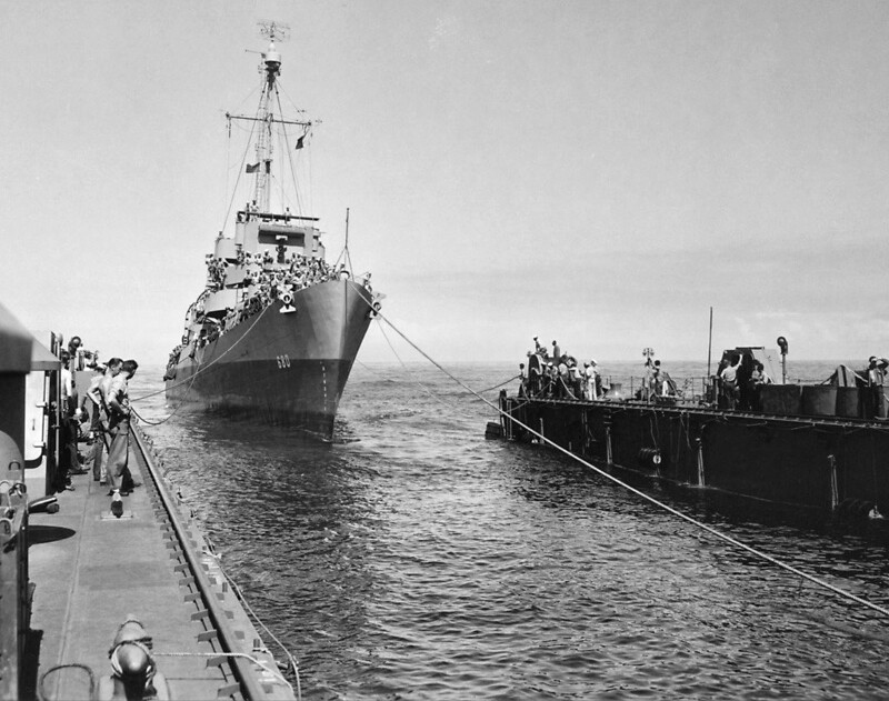 USS Loeser (DE-680) - N12525C.jpg :: USS Loeser (DE-680), Destroyer Escort, WW II - US NAVY PHOTO: USS Loeser (DE-680) entering the floating drydock USS (ARD-21) with the drydock underway at 2 knots. This was done in a secure area off Pearl Harbor and Loeser was carried back in to the Pearl Harbor East Loch aboard USS (ARD-21), 26 Apr 1945.