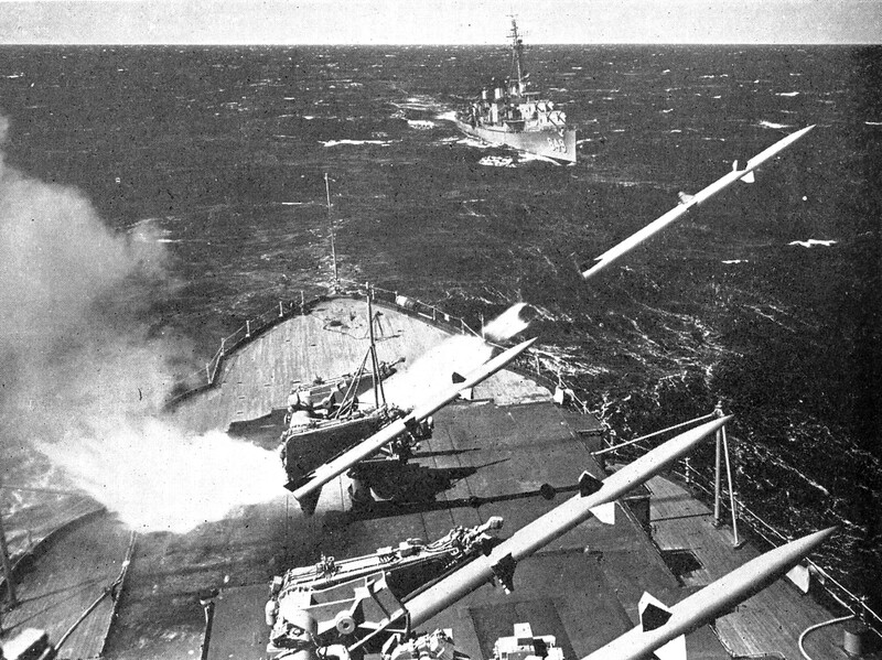 USS Mississippi (AG-128) - N38001B.jpg :: USS Mississippi (AG-128), Gunnery Training Ship, WW II - US NAVY PHOTO: Terrier guided missile being launched from the stern of the USS Mississippi (AG-128). Note the destroyer USS Richard E. Krause (DD-849) in the background.