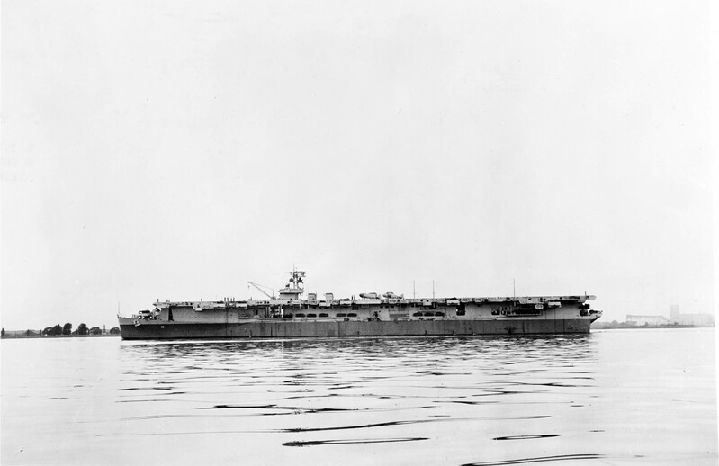 USS Monterey (CVL-26) - N611J.jpg :: USS Monterey (CVL-26), Light Aircraft Carrier, WW II - US NAVY PHOTO: Port side view of USS Monterey (CVL-26) on 17 Jul 1943, taken outside Philadelphia Navy Yard. Radar SK and SC-2 can be made out, and the aircraft on deck are SNJ trainers. Above the forward identification number can be seen the A-shaped opening which was characteristic of this class; these were later partly or completely sealed off.