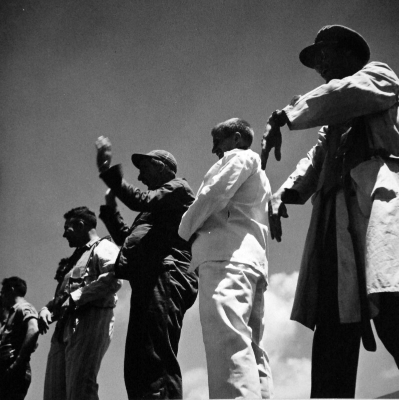 USS Monterey (CVL-26) - N613G.jpg :: USS Monterey (CVL-26), Light Aircraft Carrier, WW II - US NAVY PHOTO: Ensign Robert W. Burnett, USNR, is being greeted by his friends as he comes aboard USS Monterey (CVL-26) after being missing for three days. His friends are wearing his clothes and waving him away from the carrier. Photographed by Lieutenant Victor Jorgensen, 19 Jul 1944.