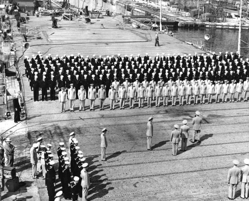 USS Monterey (CVL-26) - N614E.jpg :: USS Monterey (CVL-26), Light Aircraft Carrier, Korean War - US NAVY PHOTO: Officers and enlisted personnel of USS Monterey (CVL-26) stand at attention on the flight deck of the aircraft carrier at the Philadelphia Naval Base as Captain Donald L. Mills, USN, reads orders reactivating the warship, 15 Sep 1950.