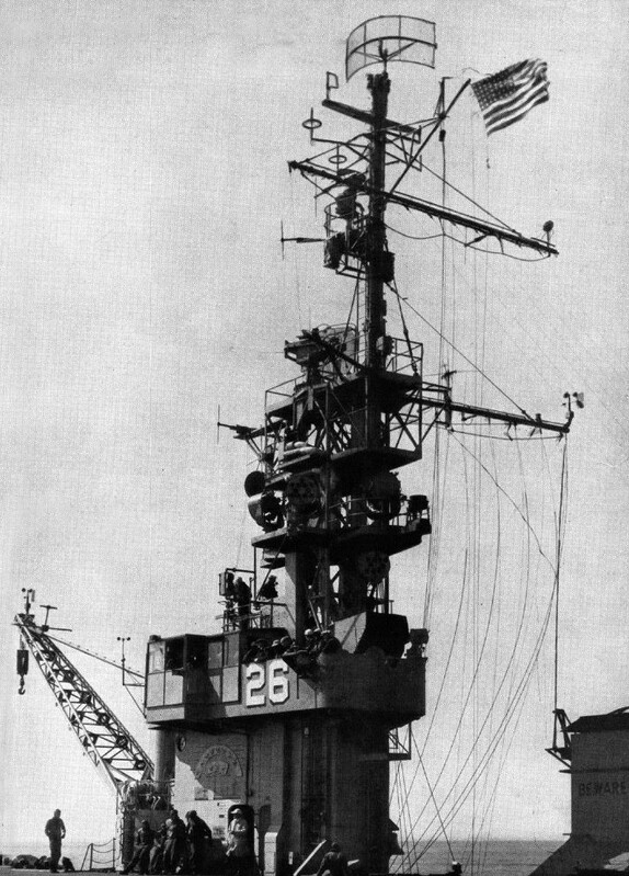 USS Monterey (CVL-26) - N614G.jpg :: USS Monterey (CVL-26), Light Aircraft Carrier, Korean War - US NAVY PHOTO: Old Glory snaps in the wind and signals halliards 'belly aft' as the aircraft carrier USS Monterey (CVL-26) turns up the knots on a cruise out of Pensacola, Fla., with visitors on board, Jun 1951.