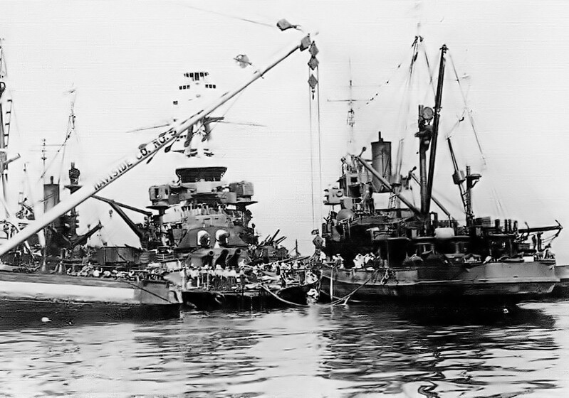 USS Nevada (BB-36) - N3062D.jpg :: USS Nevada (BB-36), Battleship, WW II - US NAVY PHOTO: Divers from the Ortolan (ASR-5) (left) and the Widgeon (ASR-1) work with the crane barge Haviside to attach the big patch to the USS Nevada (BB-36). The Ortolan had just arrived to the Waipio Point location, waiting for new plans to be issued to raise the Oglala (CM-4), Jan 1942.