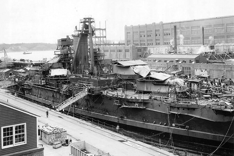 USS Nevada (BB-36) - N3062K.jpg :: USS Nevada (BB-36), Battleship, WW II - US NAVY PHOTO: USS Nevada (BB-36) summer 1942 being reconstructed after Pearl Harbor. The superstructure has totally been removed, as well as the main battery, secondary battery and turret roofs. Notice the miles of hoses and temporary structures on deck.