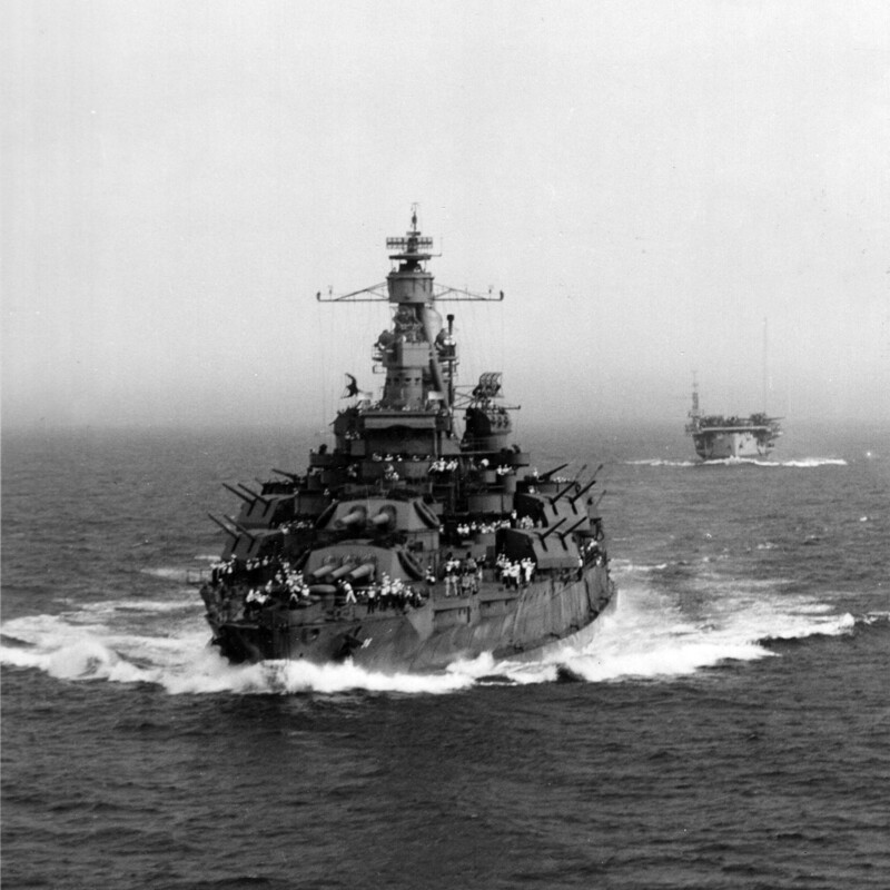 USS Nevada (BB-36) - N3063C.jpg :: USS Nevada (BB-36), Battleship, WW II - US NAVY PHOTO: USS Nevada (BB-36) after her modernization/repair after Pearl, was returning from Alaska, where she had provided fire support from 11 to 18 May 1943 for the capture of Attu. Operation Landcrab. Photo shows then Nevada in company with escort carrier USS Croatan (CVE-25) astern on 14 Jul 1943 heading for Norfolk Navy Yard for further work, which would include a big new SK air-search radar on a lattice topmast.