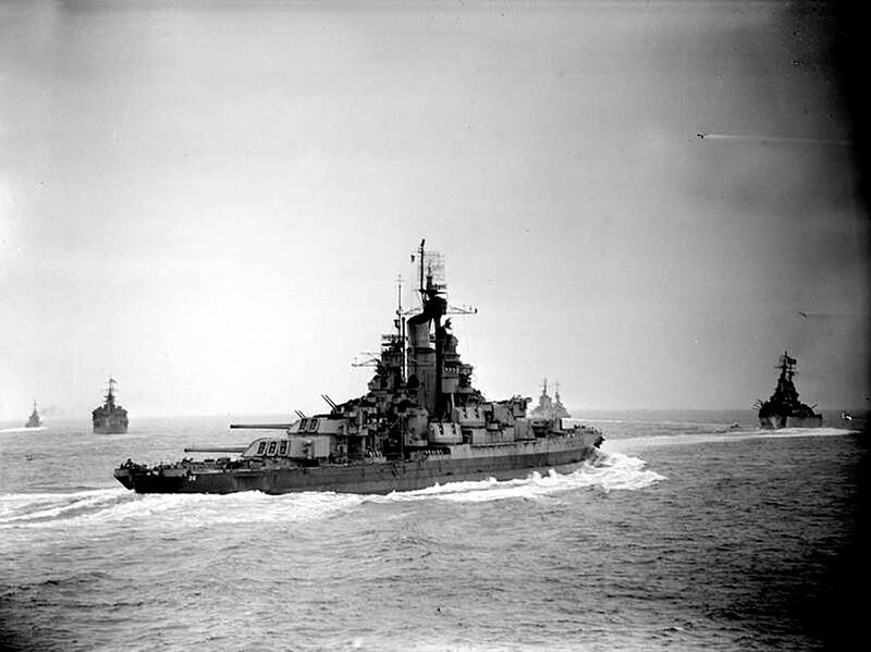 USS Nevada (BB-36) - N3063G.jpg :: USS Nevada (BB-36), Battleship, WW II - US NAVY PHOTO: With main guns trained to port, a starboard quarter view of the USS Nevada (BB-36) underway on 25 Jun 1944. The ship is moving into position off Cherbourg to bombard enemy gun batteries.
