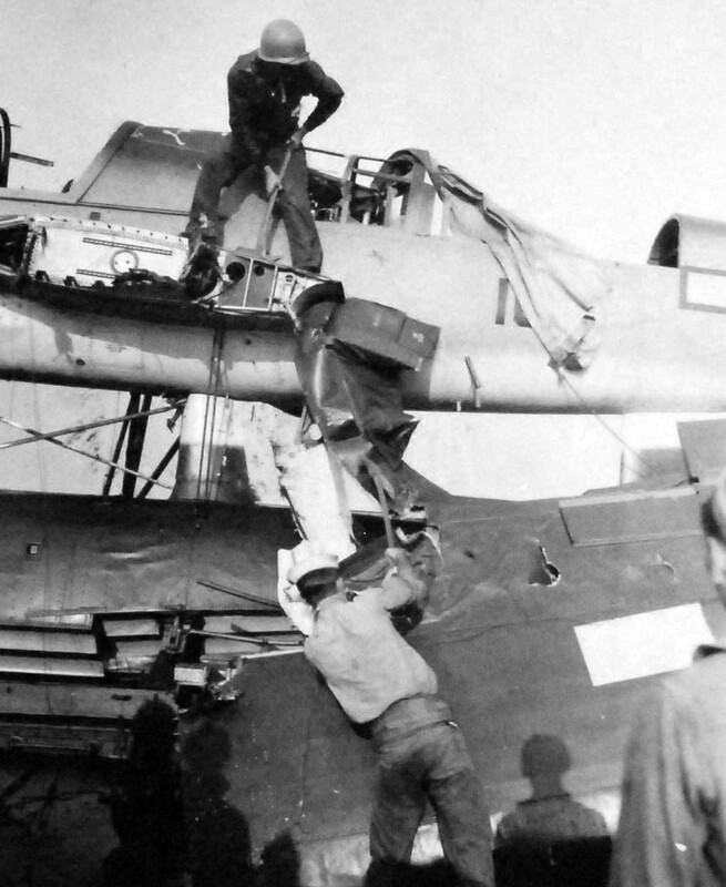 USS Nevada (BB-36) - N3064E.jpg :: USS Nevada (BB-36), Battleship, WW II - US NAVY PHOTO: Damages sustained by USS Nevada (BB-36), as a result of a Japanese suicide plane attack off Okinawa, Ryukyu Islands. Photographed by PHOM2/C J.G. Mull, 27 Mar 1945.