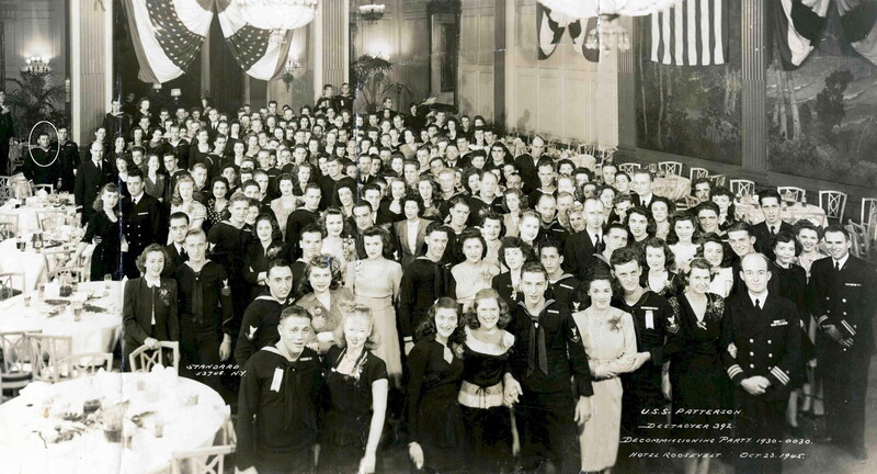 USS Patterson (DD-392) - N4363L.jpg :: USS Patterson (DD-392), Destroyer, Post-WW II - US NAVY PHOTO: The decommissioning party for Patterson (DD-392) at the Hotel Roosevelt (probably the Roosevelt Hotel in New York City), 23 Oct 1945. From the collection of Erwin A. Schroeder. Schroeder was Patterson's First Lieutenant and Damage Control Officer, and is visible all the way to the right, still wearing his J.G. stripes (though he had been promoted to full Lieutenant by the time of the party). Patterson's final Commanding Officer, Commander Alfred H. Angelo, Jr., is to the left.