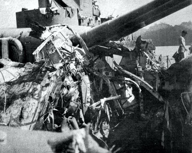 USS Portland (CA-33) - N1744D.jpg :: USS Portland (CA-33), Heavy Cruiser, WW II - US NAVY PHOTO: View of main deck damage, looking forward from the stern, on the USS Portland (CA 33). Note the 60 STS first platform deck armor plate, which caused shock damage to No. 3 turret. Battle of Guadalcanal, 13 Nov 1942.
