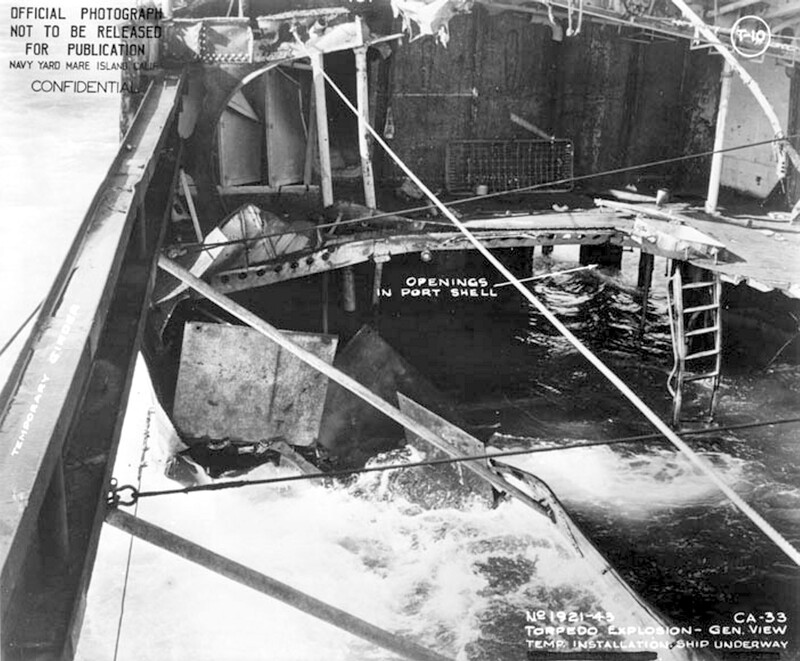 USS Portland (CA-33) - N1744F.jpg :: USS Portland (CA-33), Heavy Cruiser, WW II - US NAVY PHOTO: View of temporary repairs to starboard quarter of the USS Portland (CA-33),Cockatoo Drydock, Sydney, Australia, 1942.