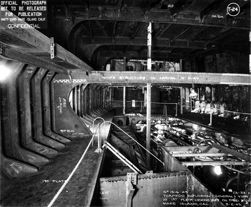 USS Portland (CA-33) - N1744L.jpg :: USS Portland (CA-33), Heavy Cruiser, WW II - US NAVY PHOTO: View of torpedo damage as it appeared upon USS Portland's arrival at Mare Island for repairs on 2 Mar 1943.