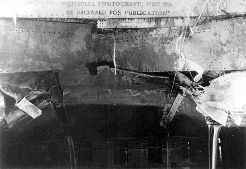 USS Raleigh (CL-7) - N2181L.jpg :: USS Raleigh (CL-7), Light Cruiser, WW II - US NAVY PHOTO: Broadside view of damage to the USS Raleigh (CL-7) caused by torpedo explosion between frames 53 and 58 on the port side, Pearl Harbor, 7 Dec 1941. Photo taken 3 Jan 1942.