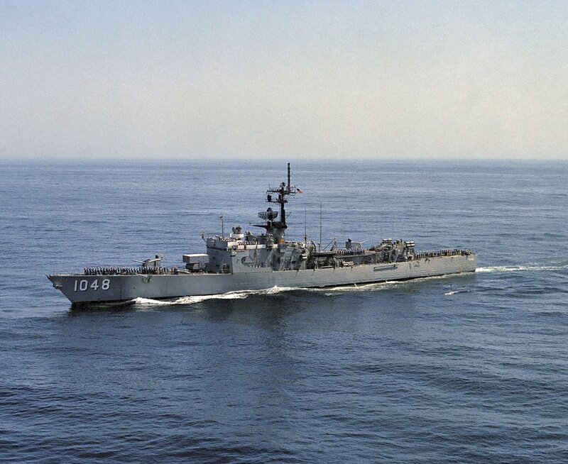 USS Sample (DE-1048) - N27022J.jpg :: USS Sample (DE-1048), Destroyer Escort, Vietnam War - US NAVY PHOTO: 14 Apr 1983: At sea - Aerial port bow view of the USS Sample (FF-1048) underway.