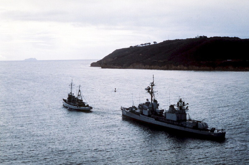 USS Southerland (DD-743) - N7113B.jpg :: USS Southerland (DD-743), Destroyer, Post-Vietnam War - US NAVY PHOTO: San Diego, 1 Jun 1981, an elevated quarter view of a fleet tug towing the destroyer USS Southerland (DD 743) out of San Diego, California. The Southerland was decommissioned from the Naval Reserve Force on 26 Feb 1981. U.S. Navy photo by PH1 David C. MacLean.