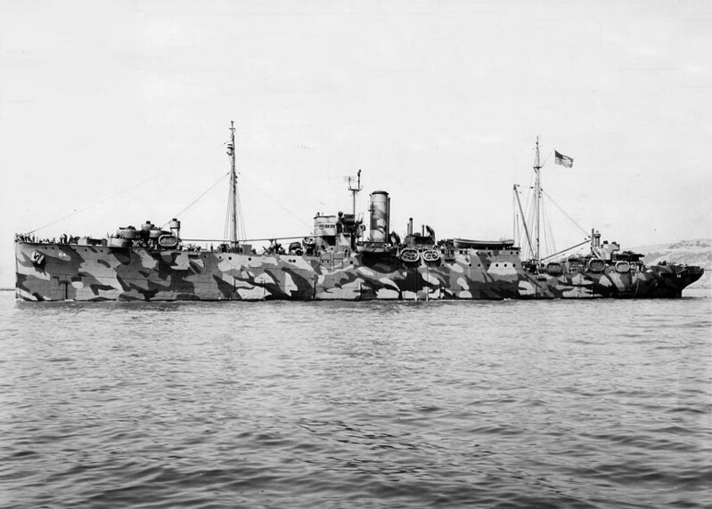 USS Vestal (AR-4) - N20152J.jpg :: USS Vestal (AR-4), Repair Ship, WW II - US NAVY PHOTO: USS Vestal (AR-4) departing Mare Island Navy Yard, 8 Sep 1944, after receiving alterations there to prepare her for duty at Ulithi. The main alteration was the filling in of her well deck forward. The disruptive pattern camouflage may be the variant of Measure 31 that used green paints.