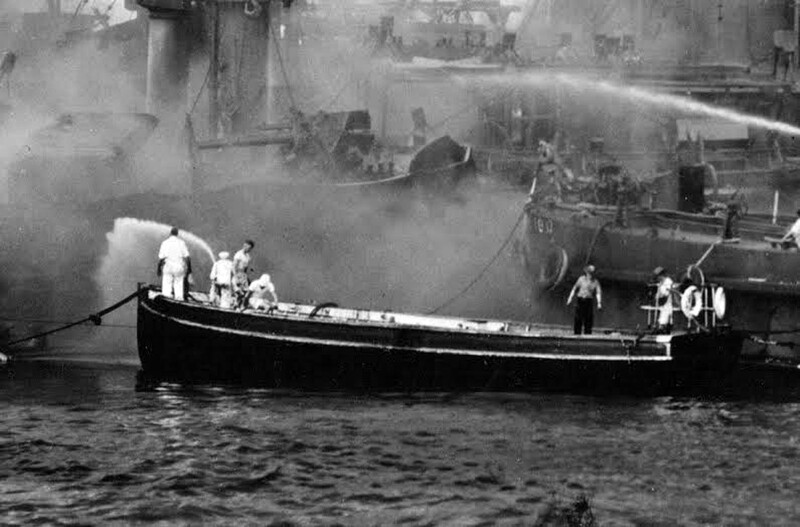 USS West Virginia (BB-48) - N3183J.jpg :: USS West Virginia (BB-48), Battleship, WW II - US NAVY PHOTO: Doris Miller stands in the bow of a motor launch near the USS West Virginia (BB-48) on 7 Dec 1941.