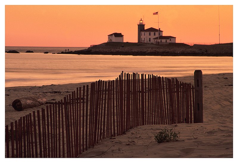 East Beach - lighthouse.jpg :: Watch Hill R.I. - The Watch Hill lighthouse with snow fencing in the foreground.