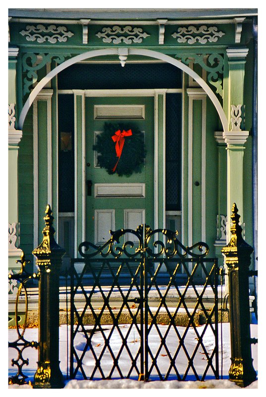 doorway-iron fence.jpg :: Mystic - An ornate iron fence frames a doorway of a shipbuilders home.