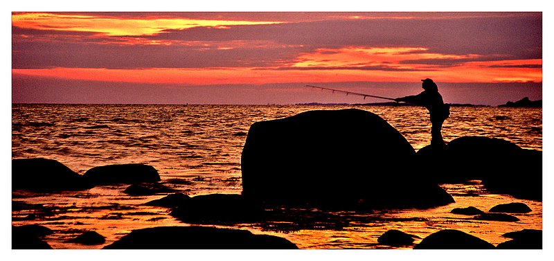 fisherman at Weekapaug.jpg :: Weekapaug R.I. - A brilliant sunset silhouettes a fisherman.