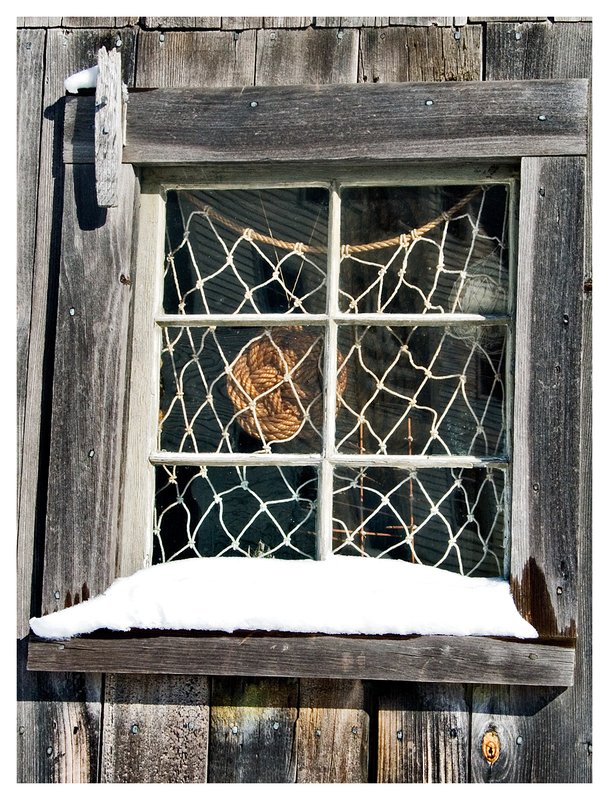 fishnet-window.jpg :: Mystic - A fisherman's net in the window of a shack.