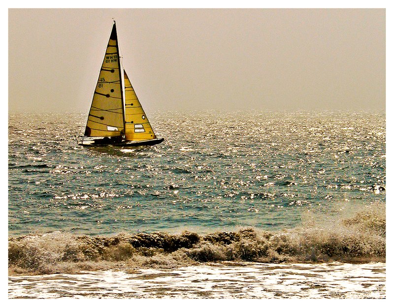 on golden sea.jpg :: Napatree R.I. - A sailboat navigates through the fog on a warm September day.