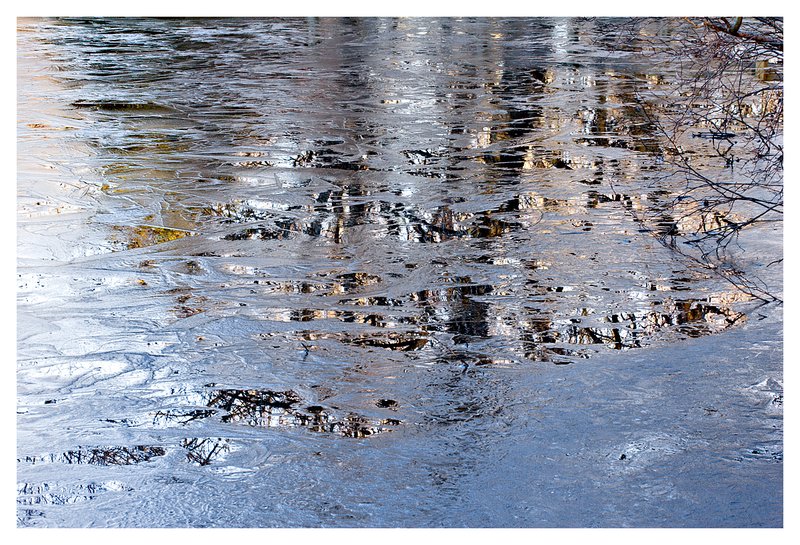 reflection in ice.jpg :: Ledyard - Trees are reflected in a melting pond on a mild winter's day.